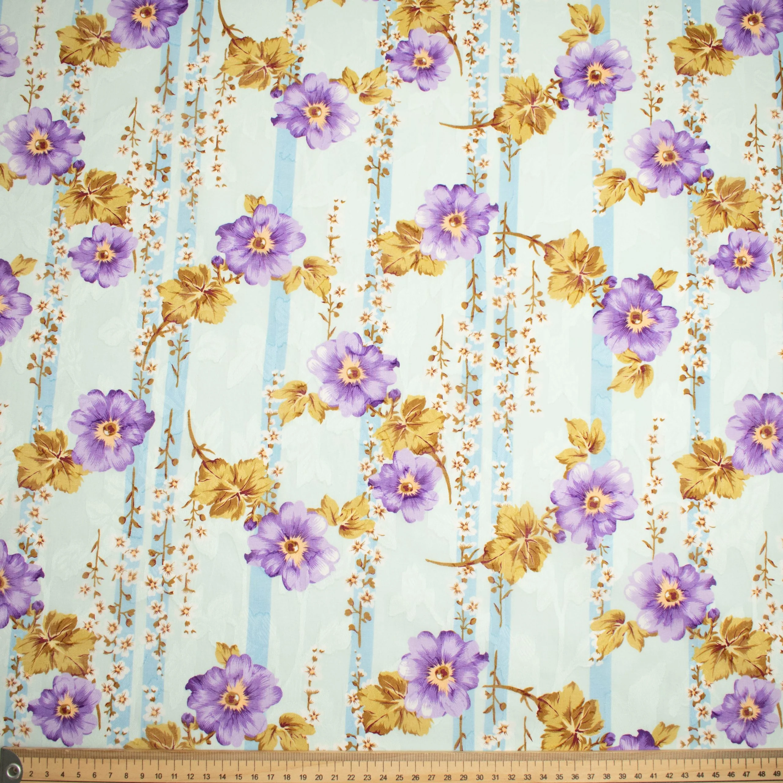 Japanese Pure Cotton Lawn Jacquard Embossed Floral Prints Design-20 Purple Flowers on Blue - Image 2