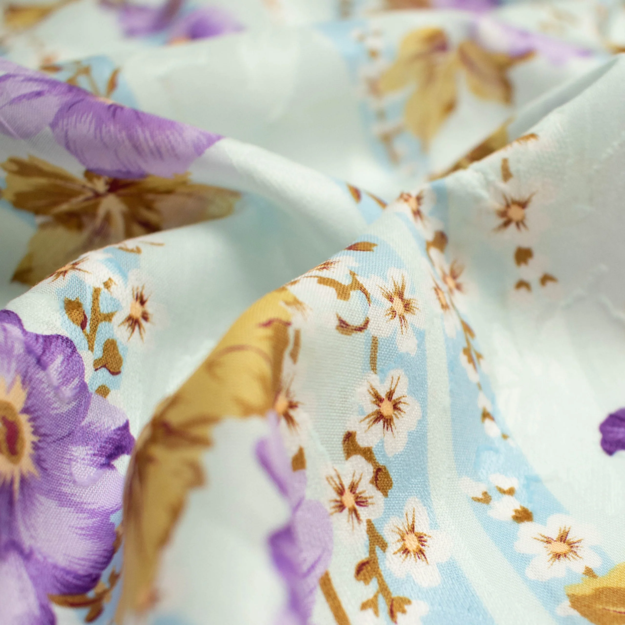 Japanese Pure Cotton Lawn Jacquard Embossed Floral Prints Design-20 Purple Flowers on Blue - Image 4