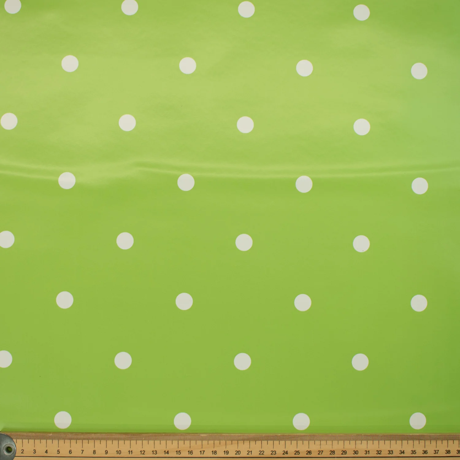 White Dots on Green Plastic Tablecloth Fabric